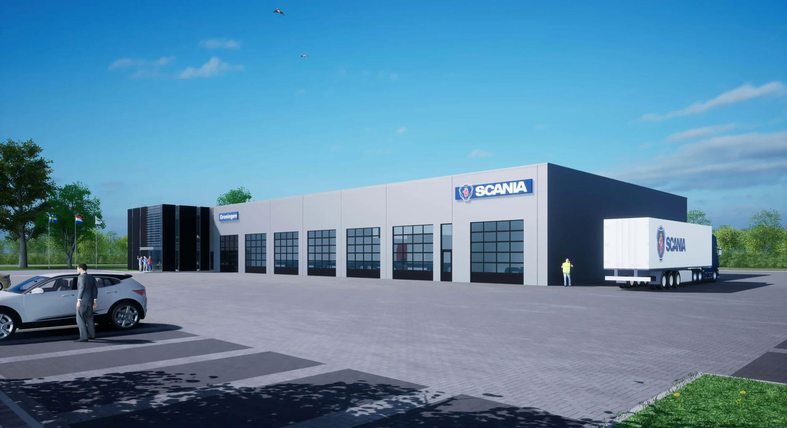 Exterior view of a Scania building with a parked truck in front and a blue sky backdrop.